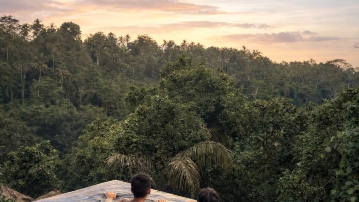 Bali jungle sunset Ubud valley warm light luxury resort atmosphere