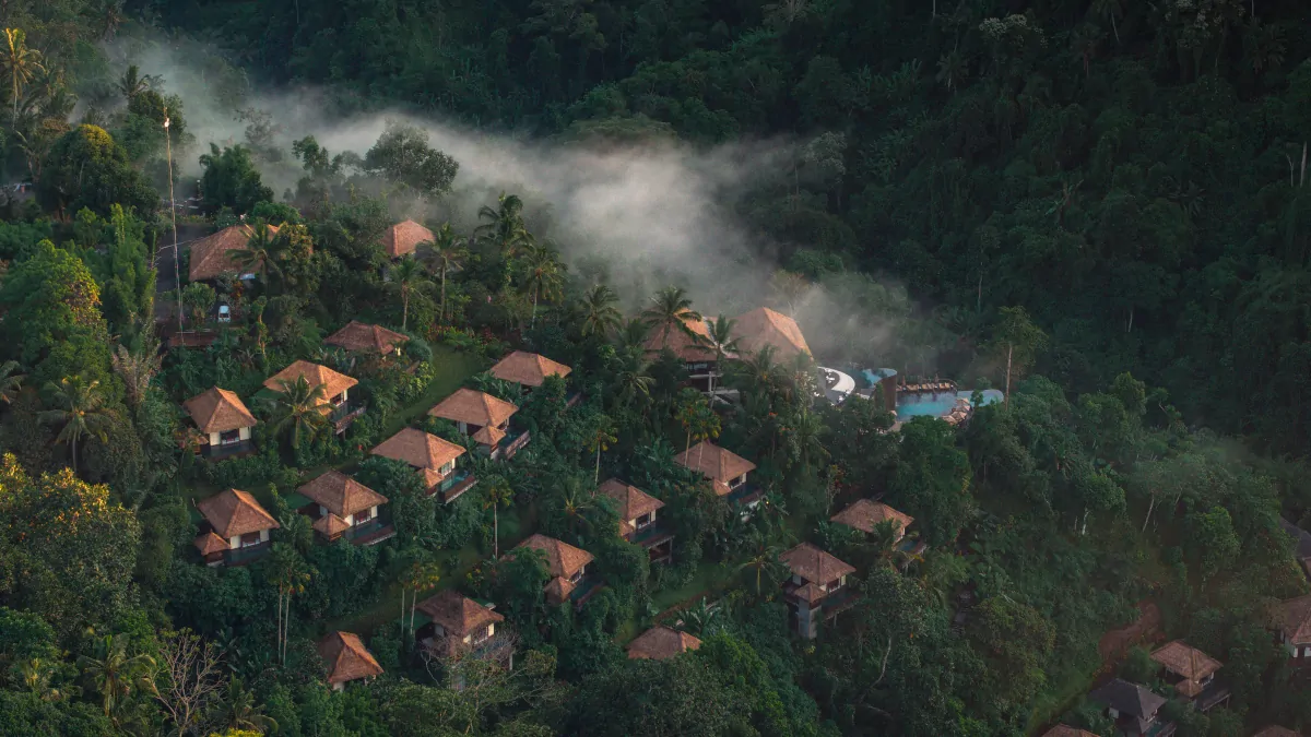 luxury jungle villa Ubud Bali morning mist calm atmosphere quiet luxury travel