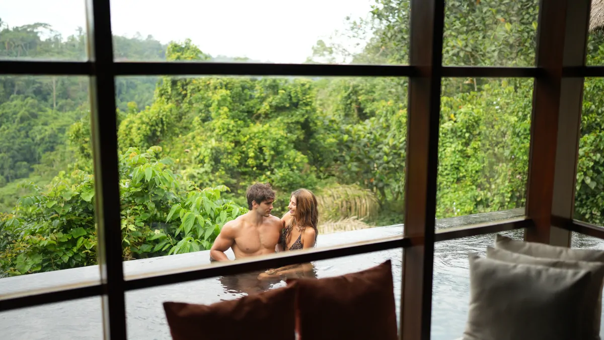 Luxury travel experience Ubud private villa rainforest view Bali