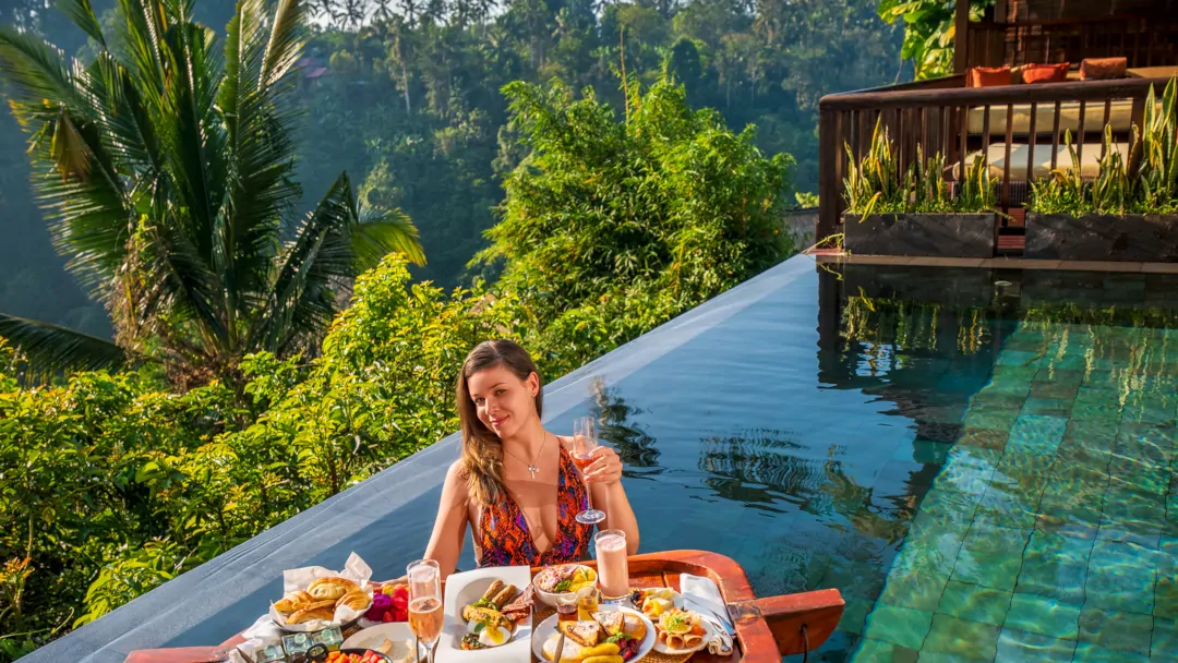 Memorable luxury experiences Bali floating breakfast rainforest